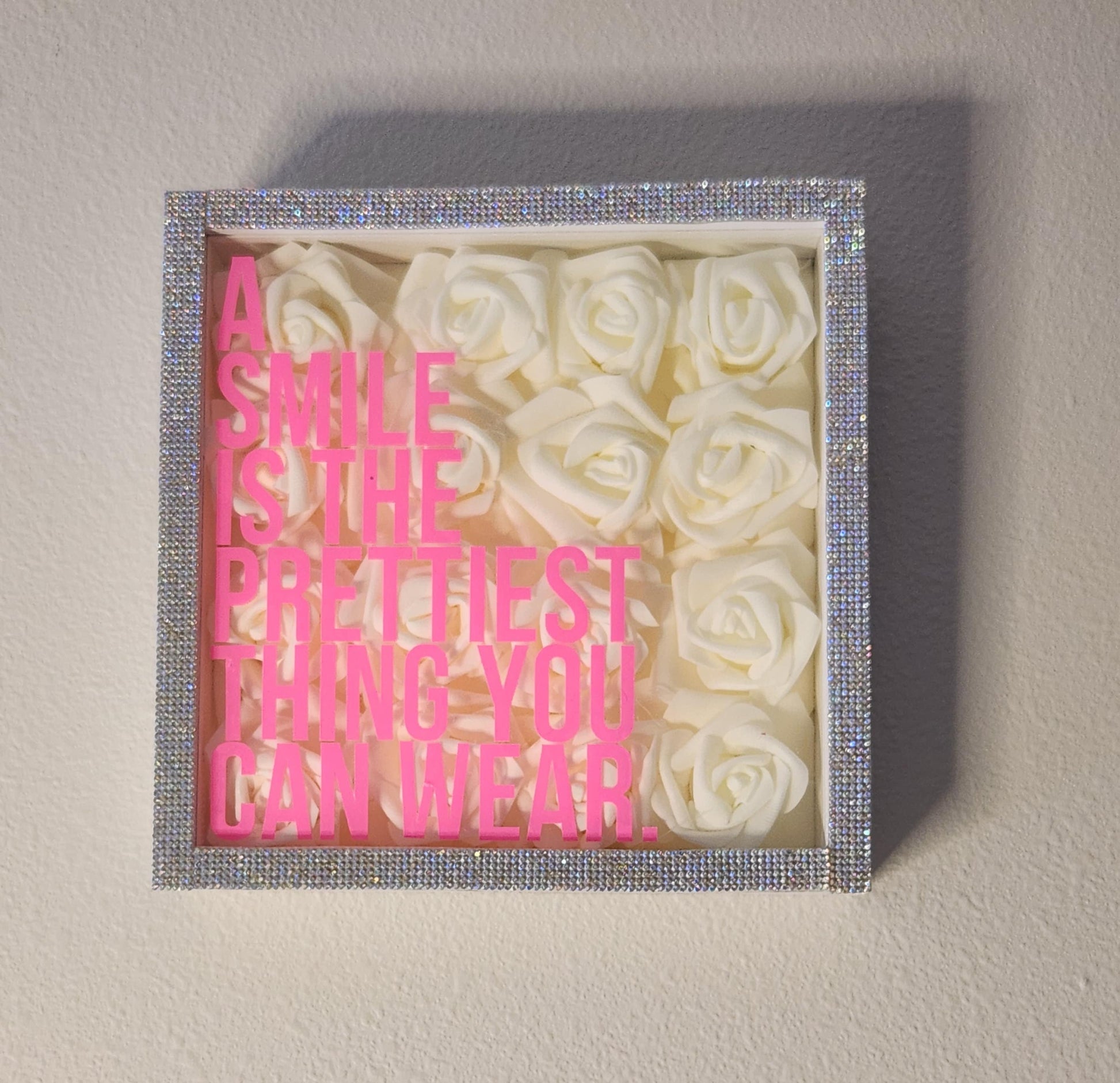 Glam Wall Art. Ivory Rose & Silver Rhinestone "A Smile Is The Prettiest Thing You Can Wear" Shadow Box. Bling Wall Decor. Glam Decor. - Glamorous Beauty & Boutique