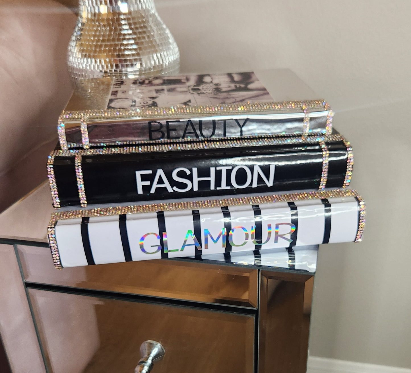 Coffee Table Book Stack (Set of 3). Glam Book Stack. Black, Metallic Silver & White Books. Glam Home Decor. Makeup Room Decor. Fashion Decor - Glamorous Beauty & Boutique