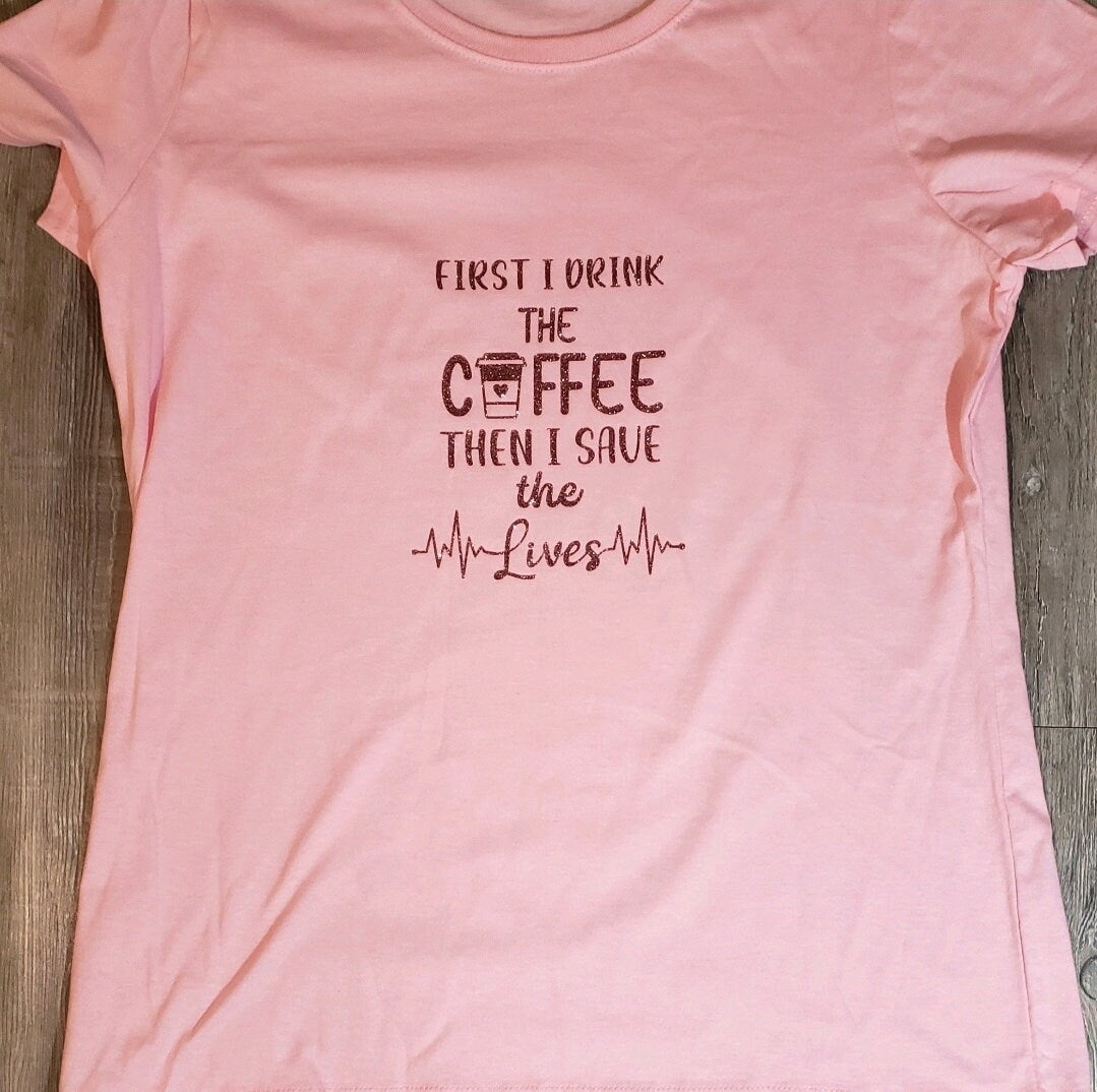 Pink "First I Drink The Coffee, Then I Save the Lives" RN Graphic Shirt. Cute Short Sleeve Nursing Shirt. - Glamorous Beauty & Boutique