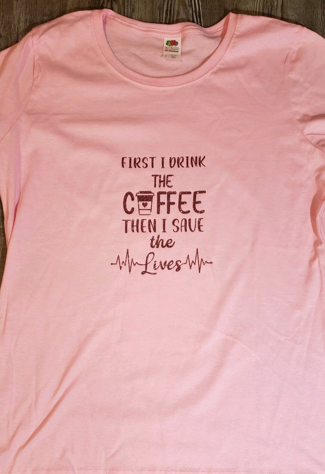 Pink "First I Drink The Coffee, Then I Save the Lives" RN Graphic Shirt. Cute Short Sleeve Nursing Shirt. - Glamorous Beauty & Boutique